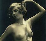 Topless Vintage Woman with a Pearl Necklace between her Breasts
