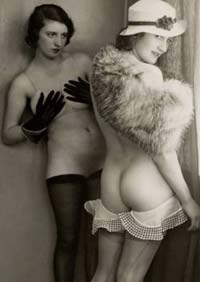 Two ladies in Stockings, Fur, Hats and Gloves